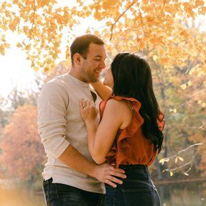 Smile Awhile Rust Red Ruffled Surplice Bodysuit